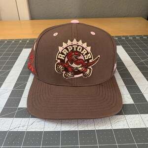 Mitchell & Ness Toronto Raptors Fitted Hat Mens 7 Brown Pink NBA 15 Years Patch